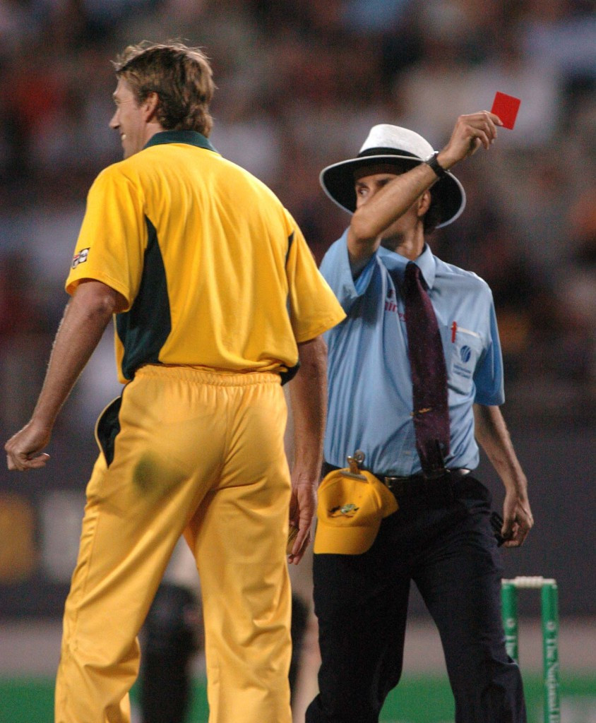 Billy Bowden jokingly shows Australian player Glenn McGrath a red card during a match in 2005. New laws will see red cards introduced to the game ©Getty Images