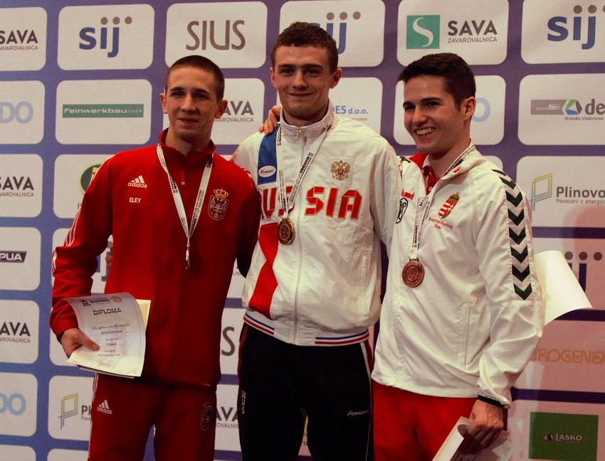 Andrei Golovkov of Russia, centre, also won the gold medal today in the 10m air rifle junior event at the European Shooting Championships in Maribor today ©ESC