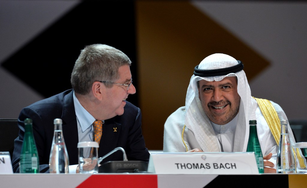 Kuwaiti powerbroker Sheikh Ahmad Al-Fahad Al-Sabah, pictured, right, with IOC President Thomas Bach, is thought to be assessing the popularity of the idea before deciding either way ©Getty Images