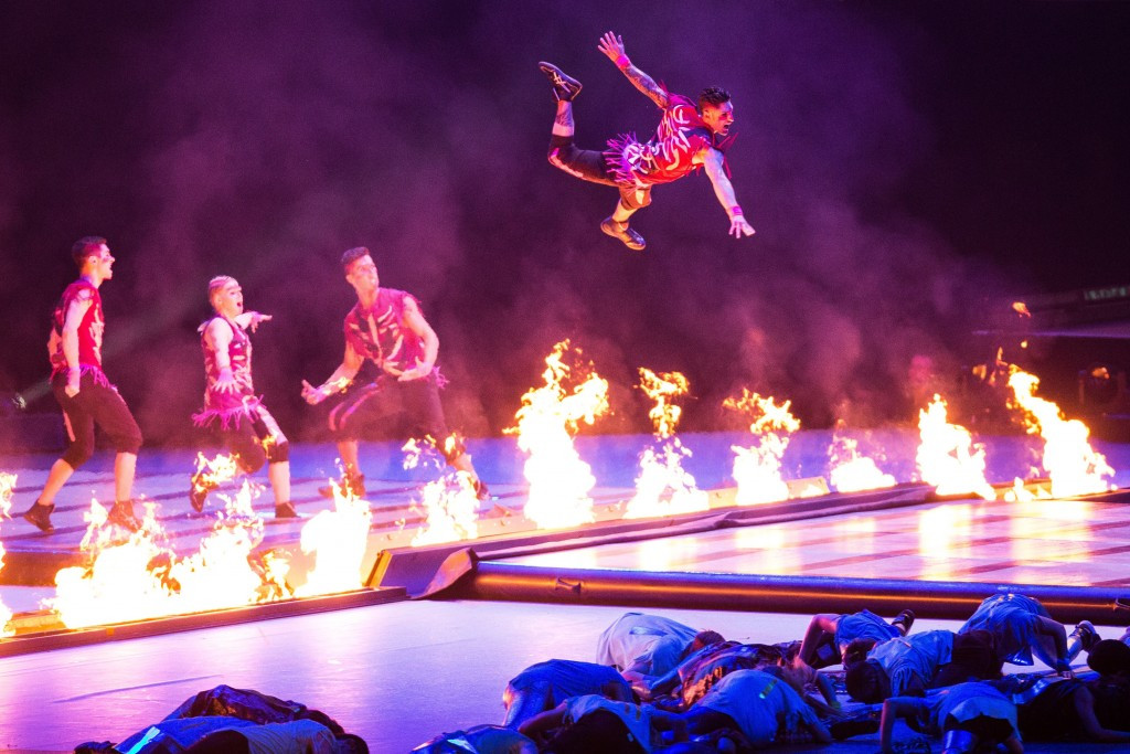 Dancers leap over Flames during the Pan American Games Opening Ceremony ©Getty Images