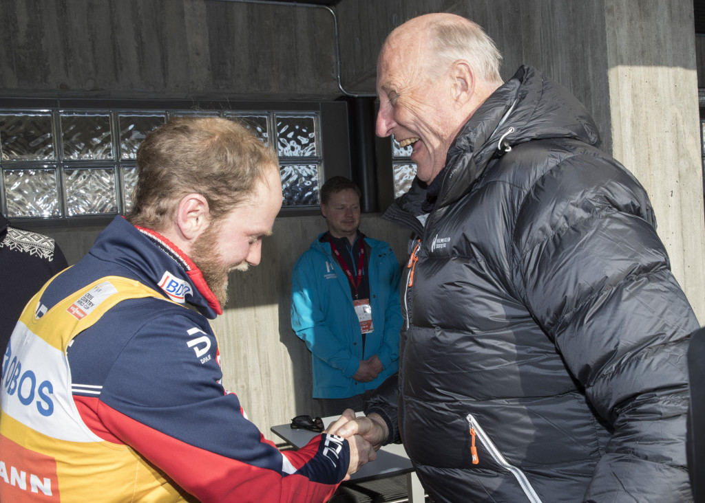 King Harald of Norway congratulates Martin Johnsrud Sundby on March 11 after the latter secured the men's FIS Cross-Country World Cup title ©Getty Images