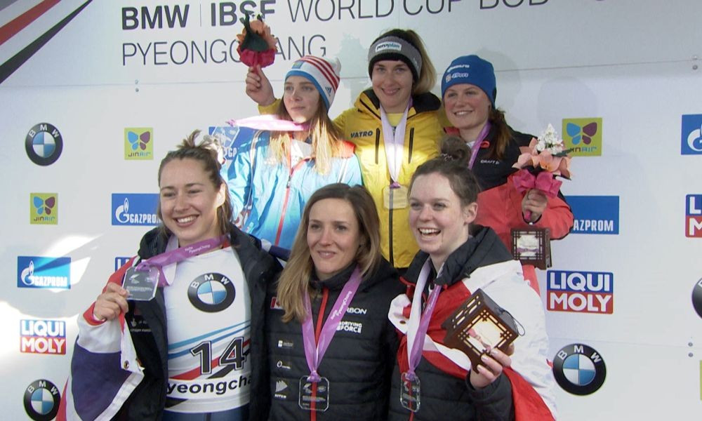 Germany's Jacqueline Lölling, centre of back row, claimed her third women's skeleton victory of the season to seal the overall World Cup ©IBSF