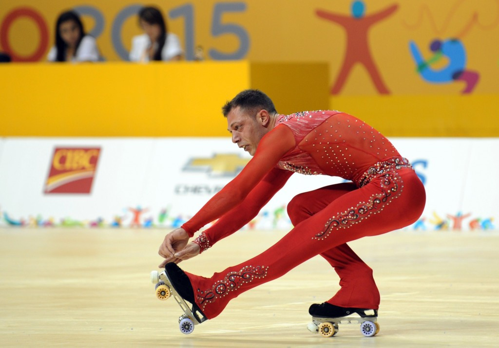 Argentinian competitor Anibal Frare stretches and strains during artistic roller skating action ©Getty Images