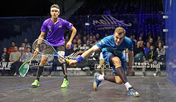 Nick Matthew, right, reached round two after he beat Spain's Borja Golan, left, in straight games ©PSA