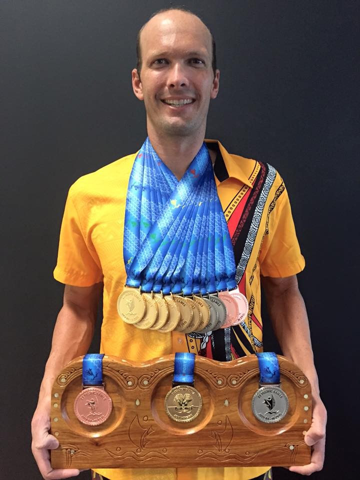 Ryan Pini poses with his haul of medals won during the swimming events at Port Moresby 2015 ©Ryan Pini/Facebook