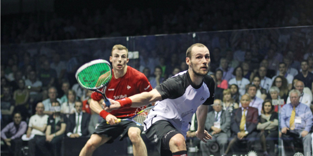 Gregory Gaultier of France, left, returned to the top of the world rankings as he overcame England's Nick Matthew ©PSA