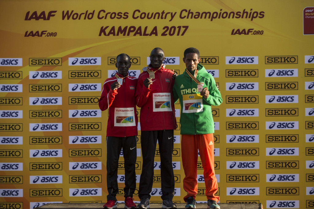He was joined on the podium by silver medal-winning compatriot Leonard Kiplimo Barsoton, left, and third-placed Abadi Hadis, right, of Ethiopia ©Getty Images