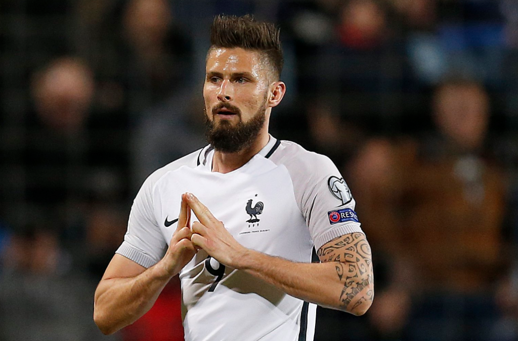 France and Arsenal footballer Olivier Giroud, pictured performing the Paris 2024 hand gesture after scoring during a World Cup qualifying win over Luxembourg on Saturday ©Paris 2024