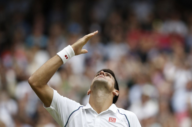Djokovic overwhelms Federer to complete successful Wimbledon title defence