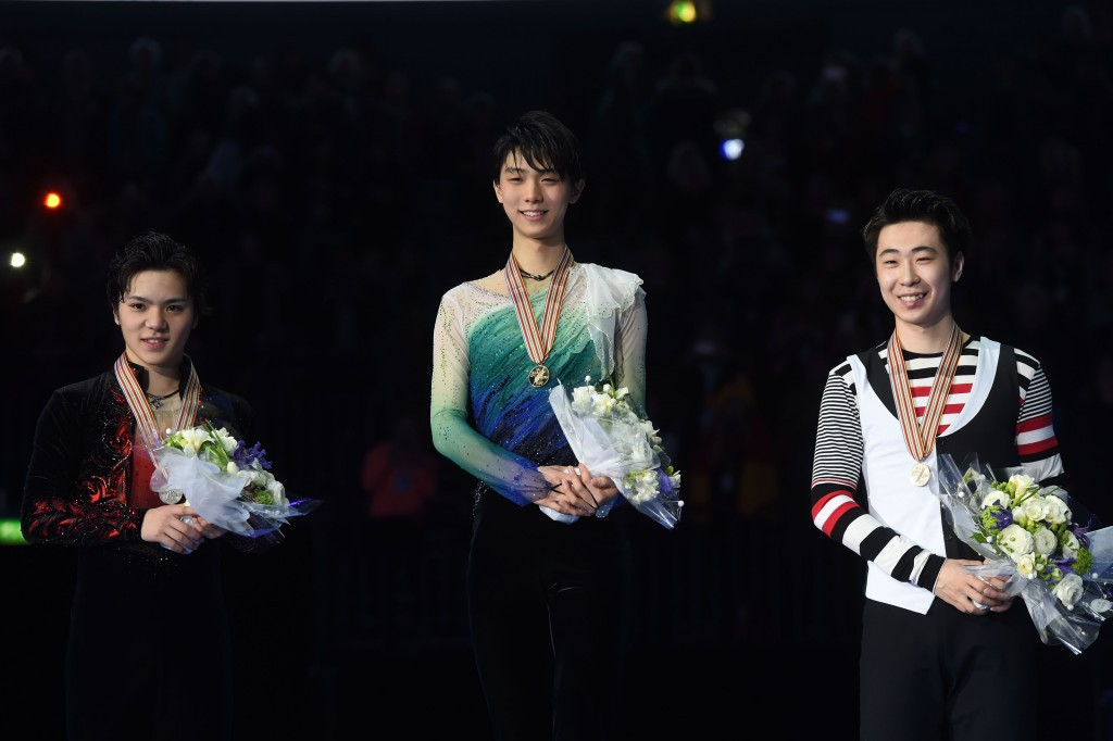 Yuzuru Hanyu, centre, led a Japanese one-two in the men's individual event ©Getty Images