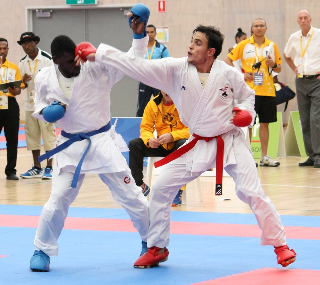 New Caledonia's Mathieu Annonier (right) won gold in the men's under 84kg individual kumite event ©Port Moresby 2015 