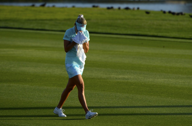 US golfer Lexi Thompson attempts to stem her tears during the final round in the ANA Inspiration tournament in California after being docked in the previous day's play ©Getty Images