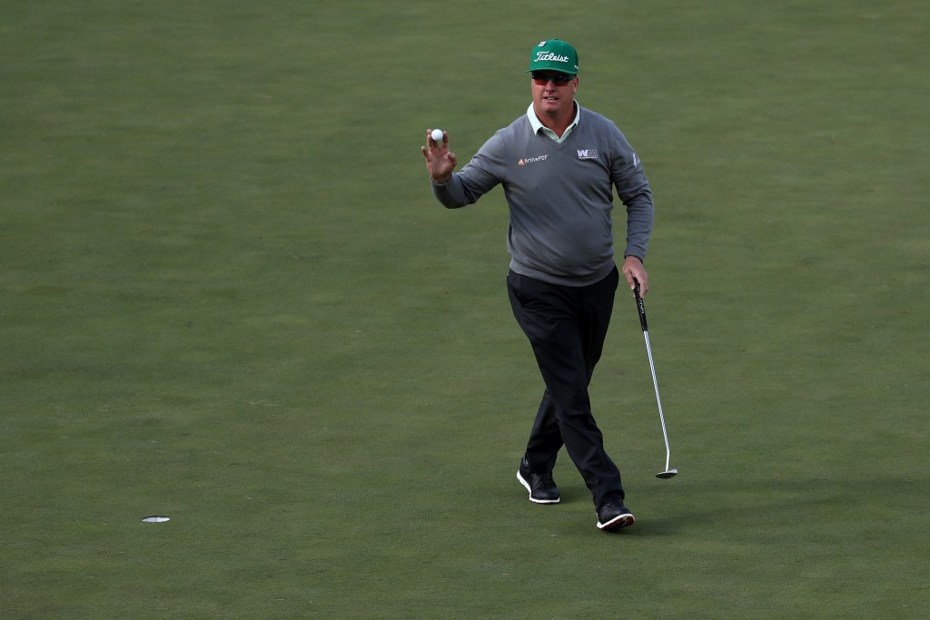 Hoffman leads Masters as injury forces Johnson's withdrawal