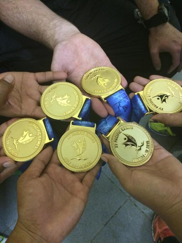 The Samoan cricket team flew home today armed with the gold medals they won by beating hosts Papua New Guinea in a thrilling final ©Twitter