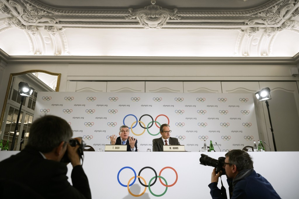 Rebecca Lowell Edwards will work with IOC Presidential spokesperson Mark Adams, right ®Getty Images