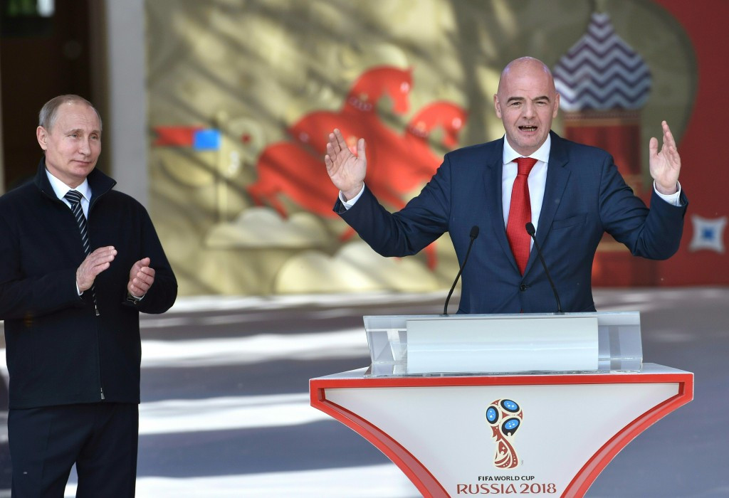 FIFA President Gianni Infantino, right, will be hoping that the 2018 World Cup in Vladimir Putin's Russia will help the world governing body's finances ©Getty Images