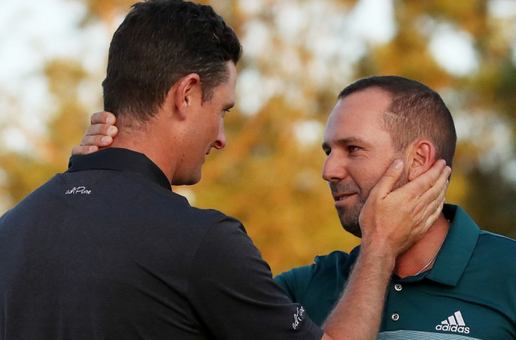 England's Justin Rose, left, congratulates Spain's Sergio Garcia on his long-awaited first victory in a major after a Masters duel between two friends that went all the way to a sudden-death play off ©Getty Images