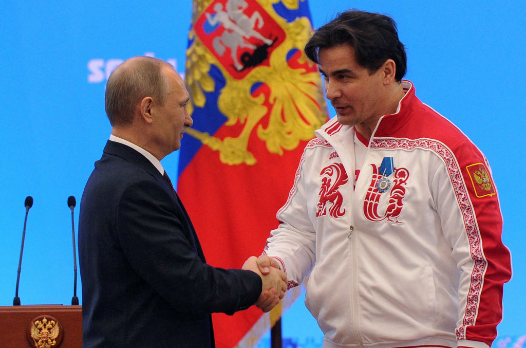 Albert Demchenko, right, pictured with Russian President Vladimir Putin at the Sochi 2014 Winter Olympics ©Getty Images