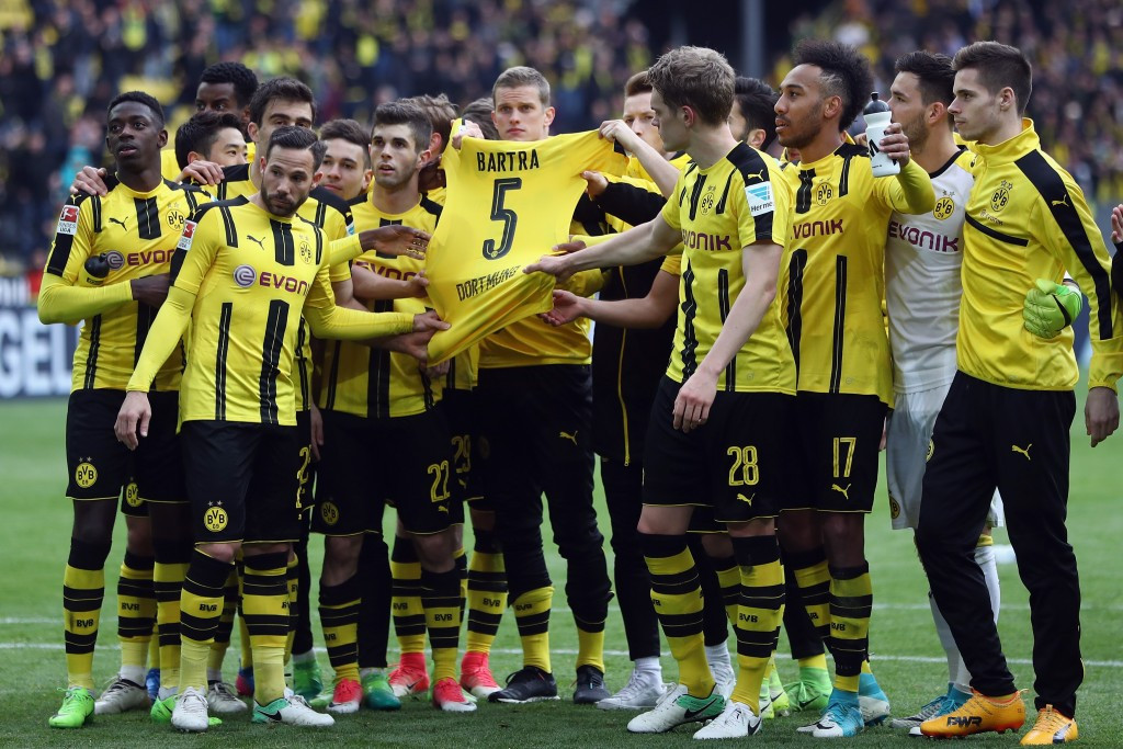 Borussia Dortmund players paid tribute to defender Marc Bartra, who was injured during the attack ©Getty Images