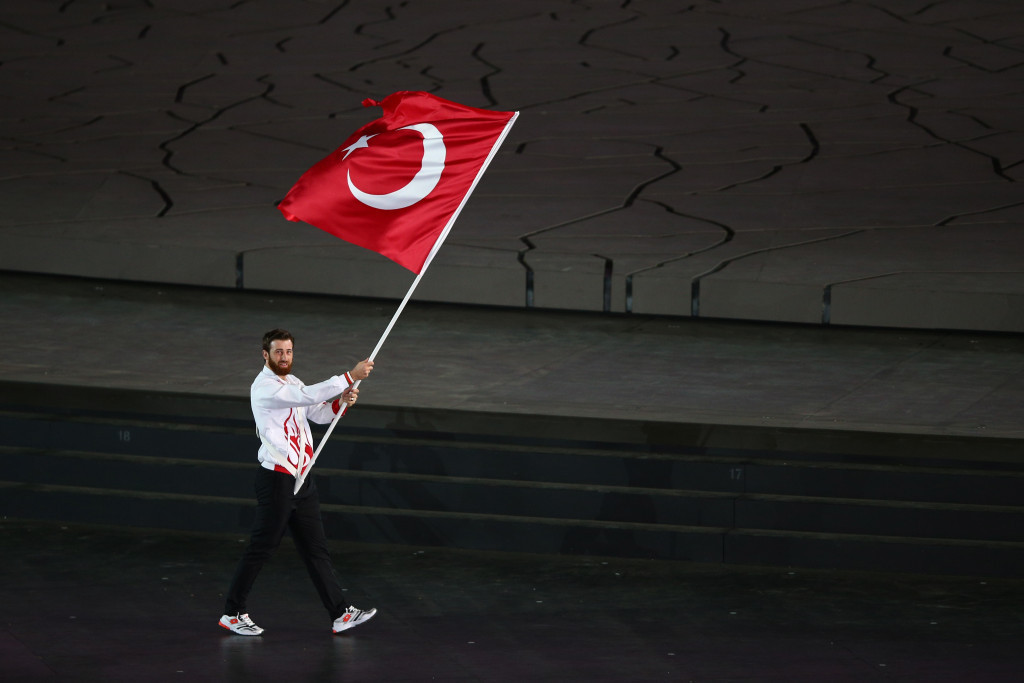 Enes Erkan, pictured carrying the Turkish flag at the Opening Ceremony of the Baku 2015 European Games, was another finalist today ©Getty Images