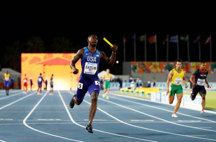 Justin Gatlin brings home the baton as the United States retain their 4x100m title at the IAAF/BTC World Relays in Nassau on a night when a faulty exchange put Jamaica out in the heats ©Getty Images for IAAF