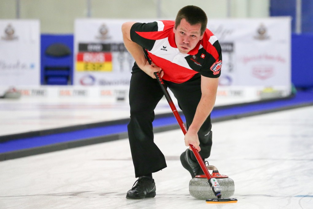 Martin Rios, pictured, helped Switzerland to two wins on the first day of the World Mixed Doubles Curling Championship in Lethbridge ©WCF/Richard Gray