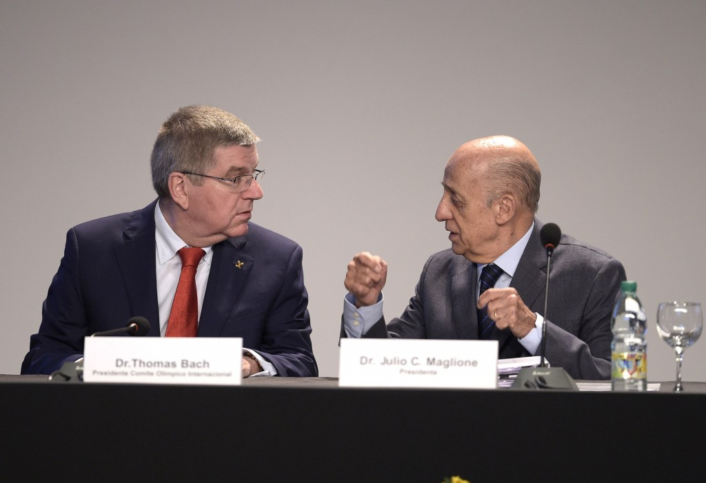Julio Maglione, right, alongside International Olympic Committee head Thomas Bach, has welcomed a decision from Italy's Paolo Barelli to stand against him for FINA President ©Getty Images