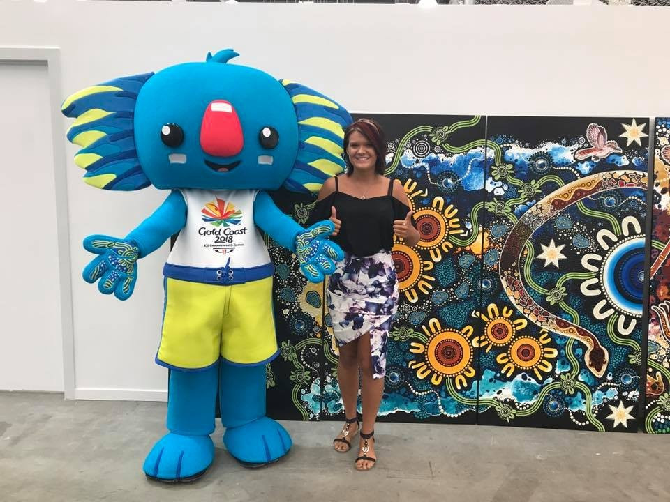 Gold Coast 2018 mascot Borobi with Indigenous artist Cher'nee Sutton, who has designed a nine metre painting featuring volunteer applicants' fingerprints for the Volunteer Selection Centre ©Gold Coast 2018