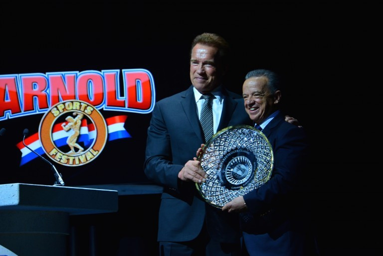 Rafael Santonja, right, pictured receiving a Lifetime Achievement award from Arnold Schwarzenegger during a bodybuilding show last year ©IFBB