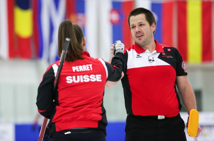 Switzerland's Jenny Perret, left, and Martin Rios, right, won the World Mixed Doubles Curling Championships title ©WCF