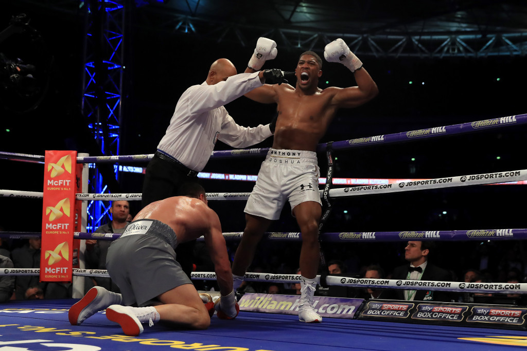 Anthony Joshua celebrates sending Wladimir Klitschko to the canvas during the fifth round on Saturday in Wembley Stadium ©Getty Images