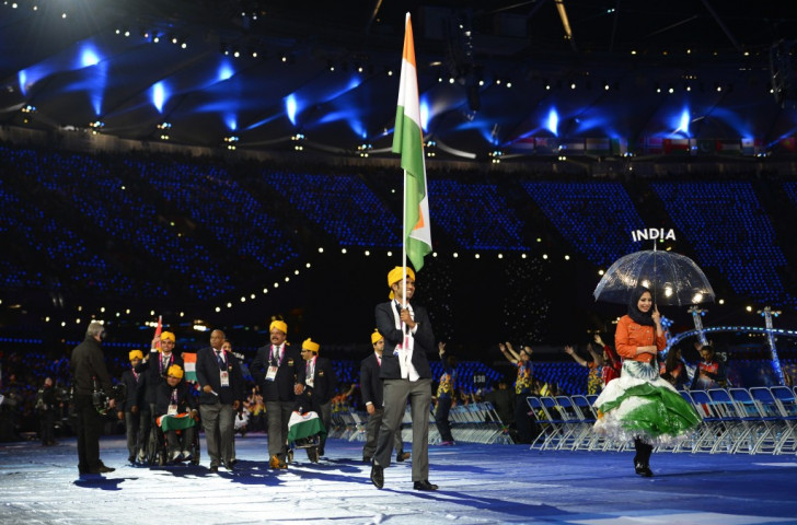 India, who's team is pictured at the Opening Ceremony of London 2012, risk missing Rio 2016 after being banned by the IPC ©AFP/Getty Images