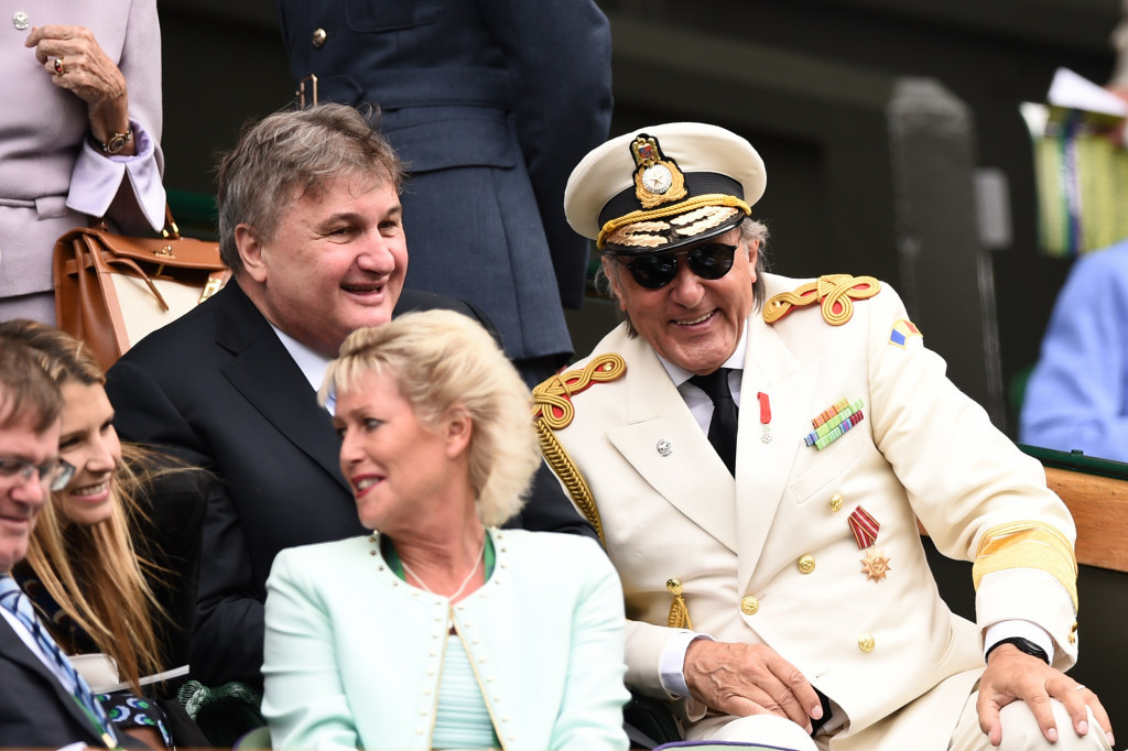 Ilie Nastase, right, in the Royal Box on Centre Court at Wimbledon. Organisers have said he will not be invited this year ©Getty Images