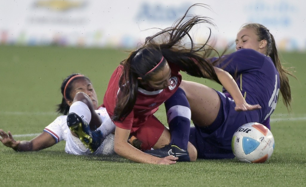 The women's football competition also continued ©AFP/Getty Images