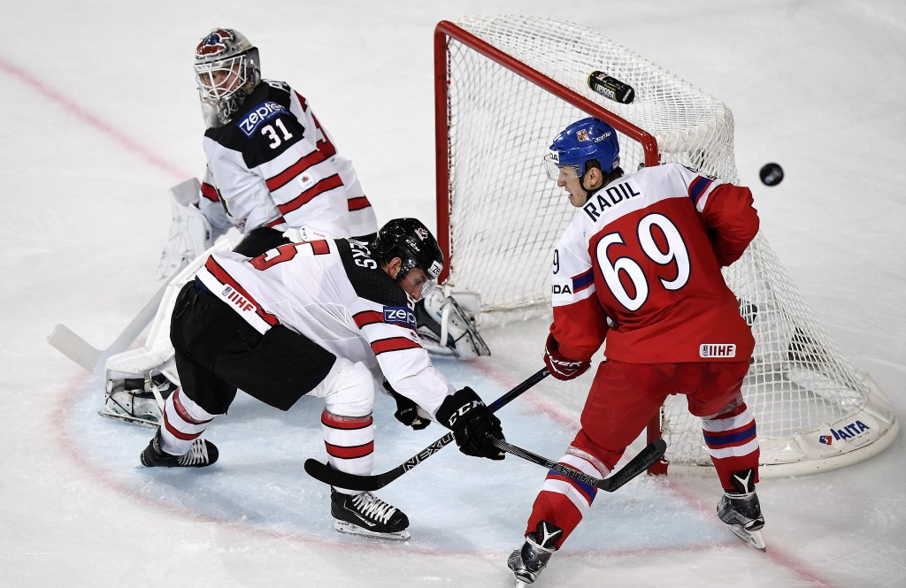 Defending champions Canada began with a victory ©Getty Images