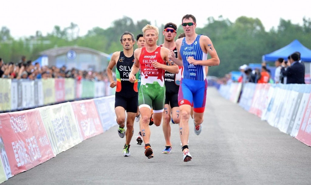 Russia’s Dmitry Polyanskiy, blue, eased into the final of the men's event at the ITU World Cup in Chengdu ©ITU