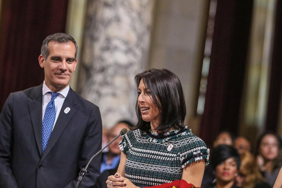 Janet Evans, four-times Olympic swimming gold  medallist, speaks at an LA Games event alongside the city's Mayor Eric Garcetti ©Getty Images