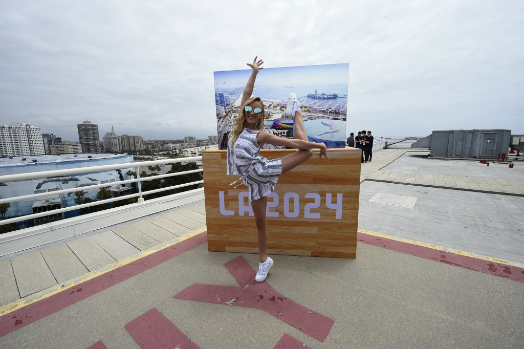 Los Angeles 2024 bid ambassador Nastia Liukin poses on the roof of the Hyatt Regency roof when showcasing the bid ©Twitter