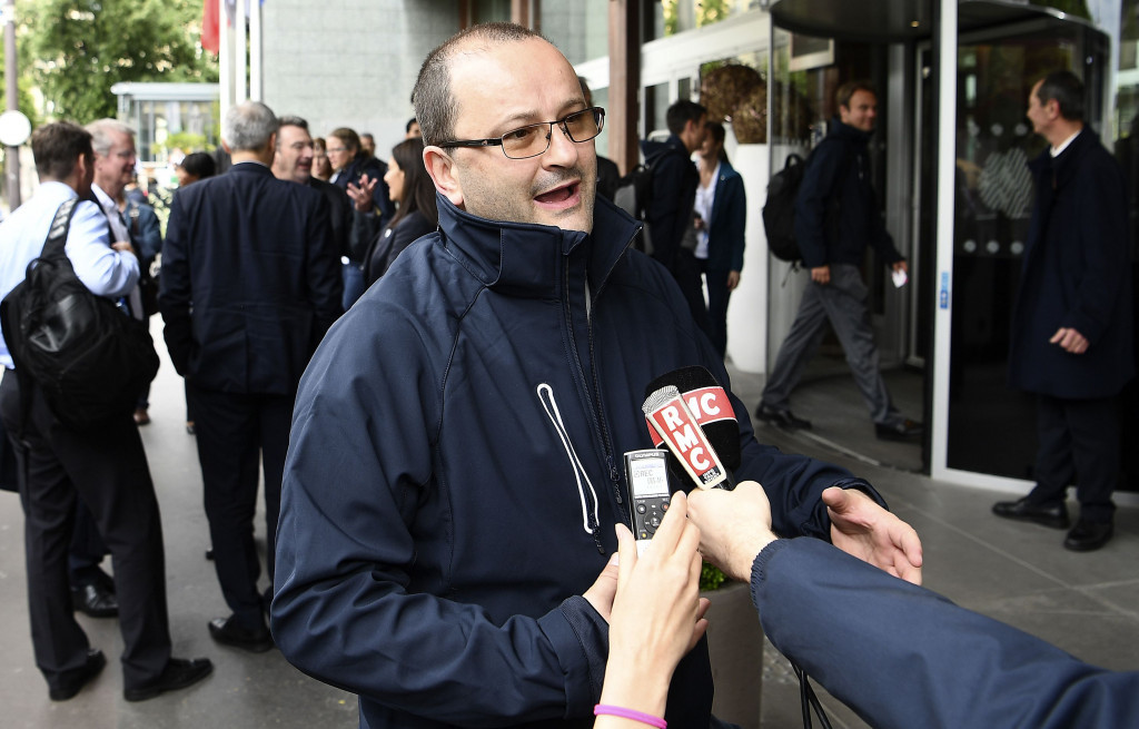 IOC Evaluation Commission chairman Patrick Baumann spoke to the media on his arrival to the hotel ©Paris 2024