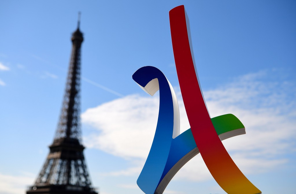 The Paris 2024 logo pictured next to the Eiffel Tower ©Getty Images