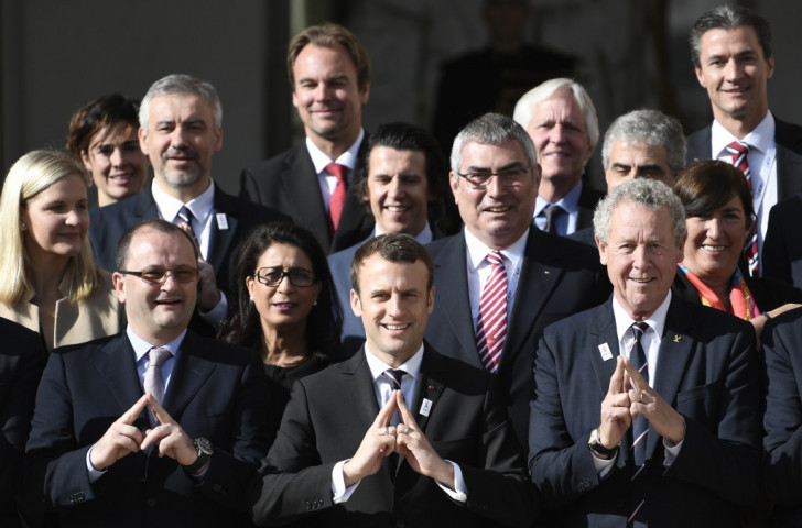 France's new President Emmanuel Macron is pictured front centre at the Elysees Palace alongside IOC Evaluation Commission President Patrick Baumann, left, and French IOC member Guy Drut, right ©Getty Images 