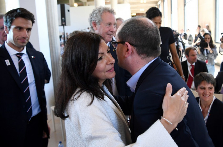 The Mayor of Paris, Anne Hidalgo, greets the President of the IOC Evaluation Commission for the 2024 Games Patrick Baumann in Paris this week, as Paris 2024 co-chairman Tony Estanguet looks on ©Getty Images