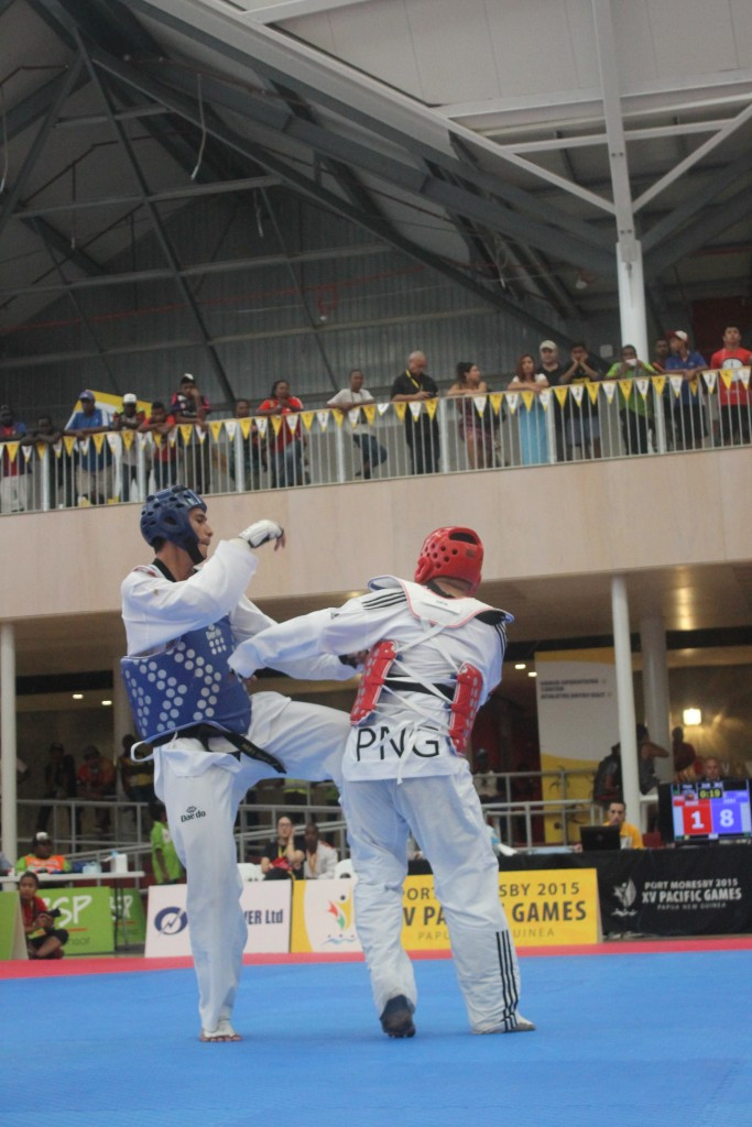 Tahiti's Lloyd Tuarai Hery (left) won gold in the men's over 87kg taekwondo category