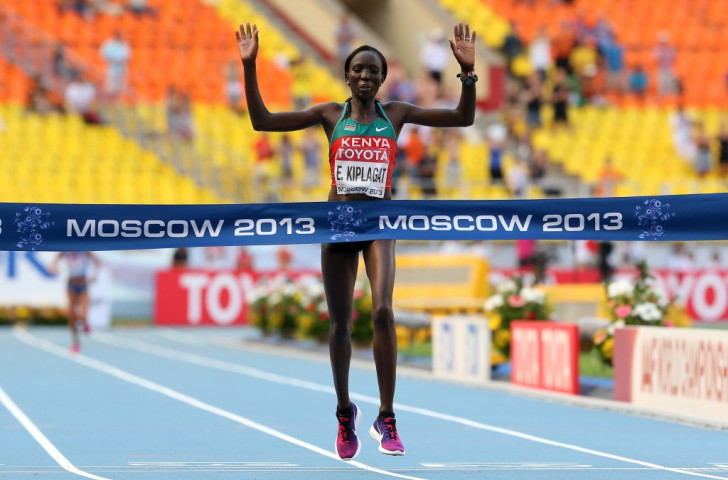 Kenya's Edna Kiplagat wins the marathon title on the opening day of the IAAF Championships in Moscow in front  of a sparse Luzhniki Stadium crowd 