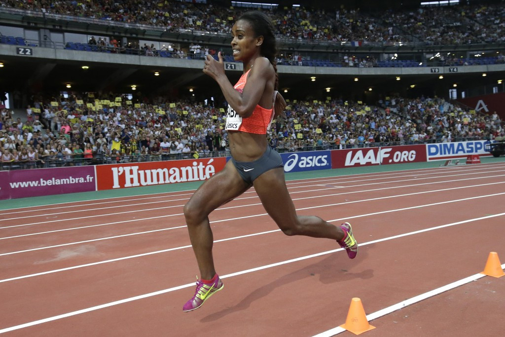 Genzebe Dibaba of Ethiopia kicks for home en route to setting a women's world 1500m record of 3:50.07 at tonight's IAAF Diamond League meeting in Monaco 