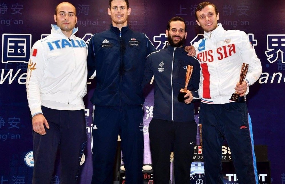 Richard Kruse, second left, claimed a superb victory today in Shanghai ©FIE/Twitter