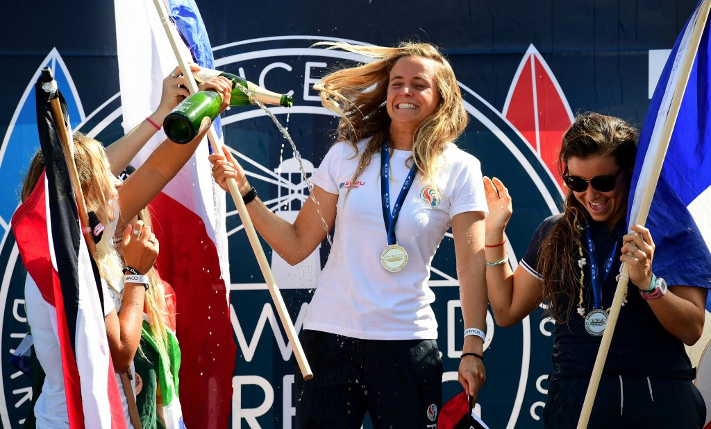 Pauline Ado, centre, won the women's gold medal at the ISA World Surfing Games ©Getty Images