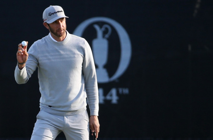 American Johnson maintains The Open lead as Woods falters again at St Andrews