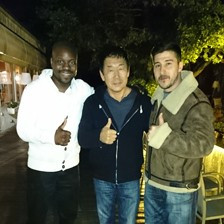 FIG President Morinari Watanabe, centre, has met with Parkour founder David Belle, right, and President of the Mouvement International du Parkour, Charles Perrière, left, in Paris ©FIG