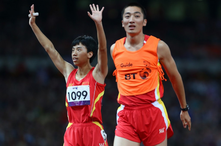 Paralympic and world champion Guohua Zhou won the women's 100m T12